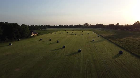 Sealed grass rolls on farmland in area the Achterhoek in the Netherlands, Aerial