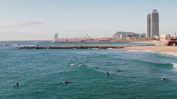 Aerial 360 Degree View People Surfers Train in Costa Dorada Lagoon