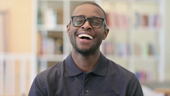 Portrait of Young African Man Laughing at the Camera