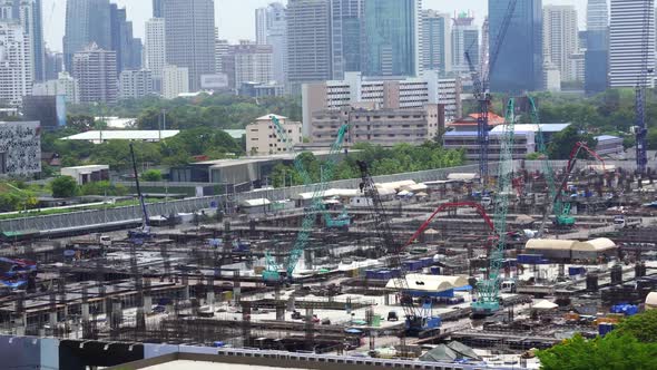 Panoramic View of Cityscape and Construction Site in Metropolis