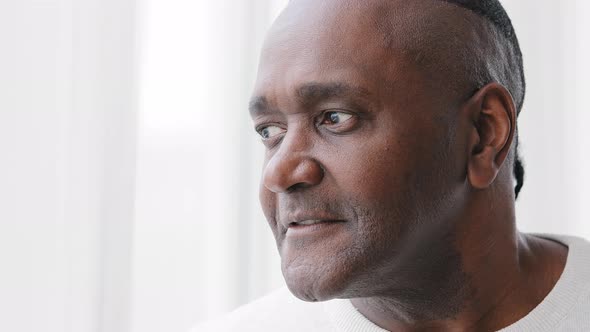 Male Portrait Old Middle Age Adult 50s African American Man Looking Out Window at Home Thinking