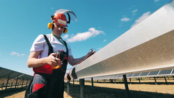 Solar Panels Are Getting Repaired By a Male Specialist