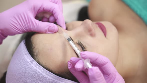 Rejuvenating facial injections.