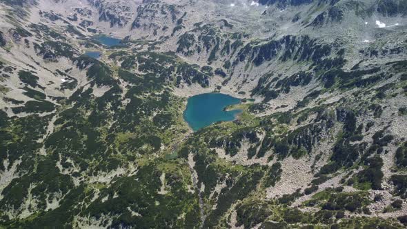 Aerial View of a Lake in the Pirin Mountains with Blue Clear Water