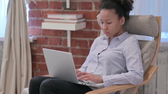 African American Woman Working on Laptop