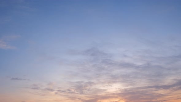 4K UHD : Time lapse of colorful sky during beautiful sunset. Romantic clouds.