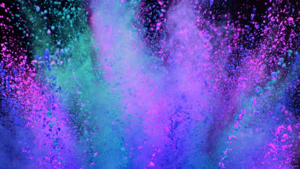 Super Slowmotion Shot of Color Powder Explosion Isolated on Black Background alt