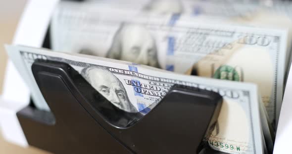 America banknote on automatic counting machine