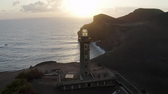 Aerial View of Farol da Ponta dos Capelinhos at sunset Capelo, Azores, Portugal.