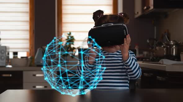 Child With Virtual Reality Headset At Home