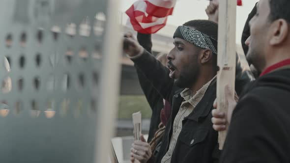 Slowmo of Activists Protesting before Riot Policemen