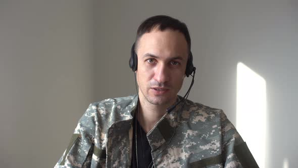 a Army Speaking Video Conferencing on Computer Using Online Video Call Consultation App