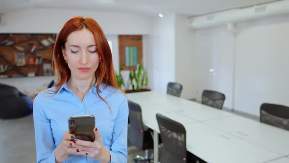 Employer Using Mobile Messaging at Workspace