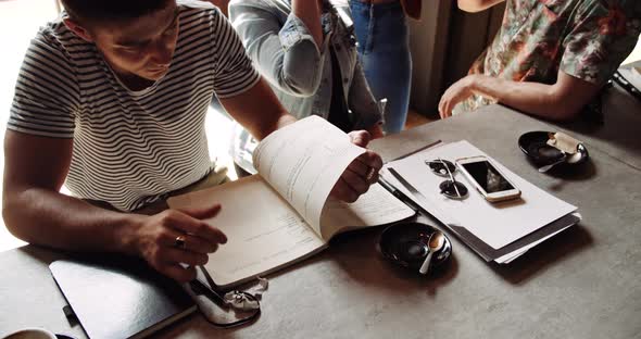 Slow motion shot of students during meeting in a cafe