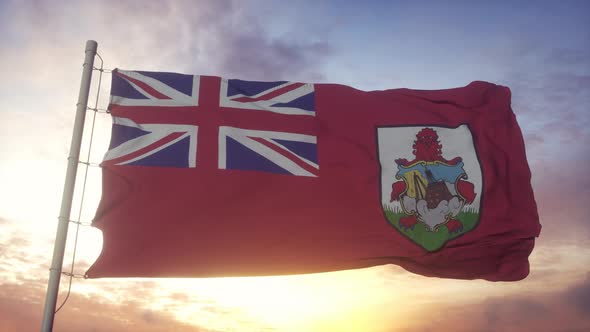 Flag of Bermuda Waving in the Wind Sky and Sun Background