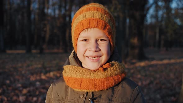 Cute Funny Boy Smiling with His Mouth Without Front Teeth