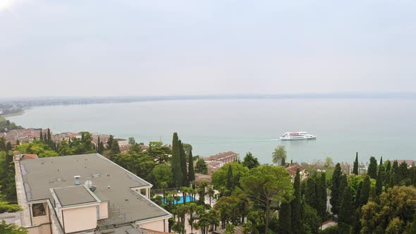 Aerial View Luxury Holidays on Shores of Island on Lake Garda Italy Luxurious Villas Beautiful Green