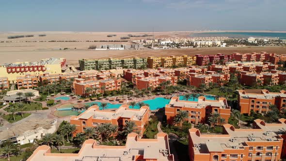 Flying from above over the hotel and the desert near Hurghada.