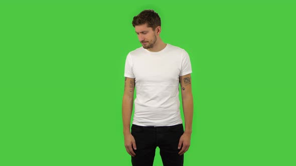 Confident Guy Is Offended and Negatively Waves His Head, Then Smiled and Sighed. Green Screen