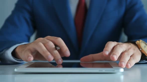 Hands Businessman Working On Tablet Computer.