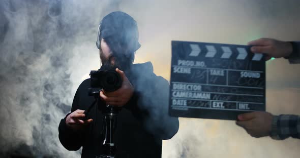 Film Crew Shooting Take of Scene in Studio