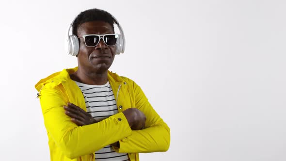 Hipster African Man in Headphones Posing for Camera