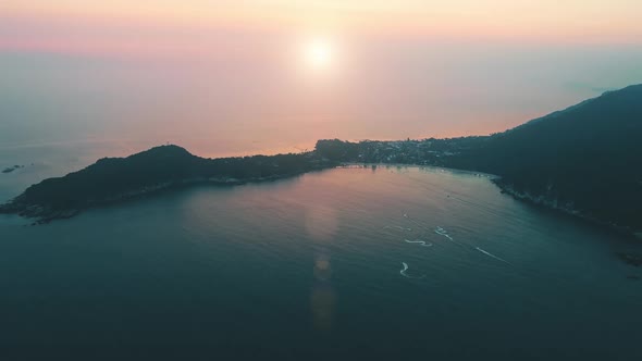 Aerial Sunset Over Bay Island Lens Flare alt