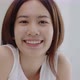 Portrait of smiling Asian girl with natural makeup and healthy smooth skin looking at camera. - VideoHive Item for Sale
