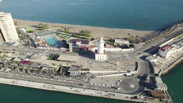 Aerial panoramic view of port of Malaga in its main street surrounded by the sea. Spain