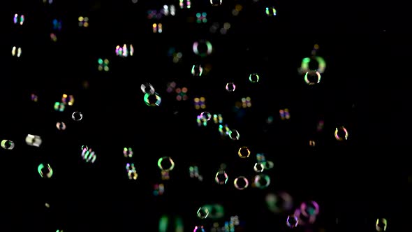 Soap Bubbles Are Flying Fast. Black Backgrounds