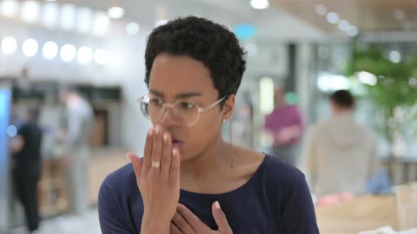 Portrait of Sick Casual African Woman Coughing 