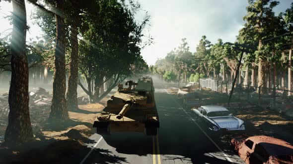 Military Tanks Ride on a Highway alt