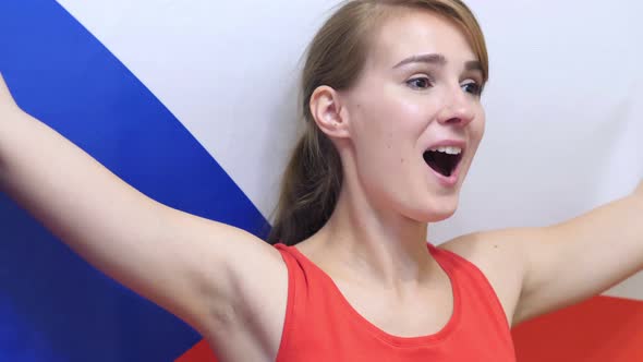 Czech Young Woman Celebrates Holding the Flag of Czech Republic