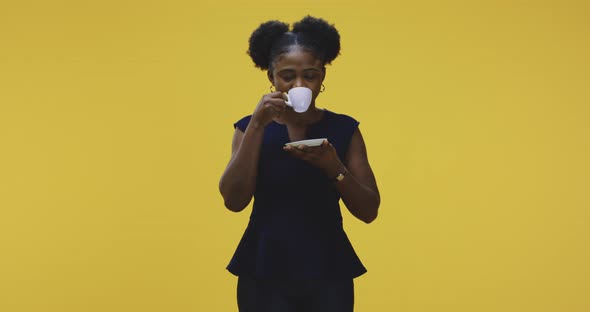 Young Woman Drinking Coffee