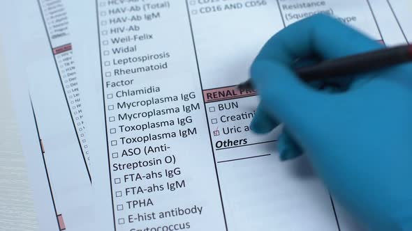 Uric Acid, Doctor Checking Name in Lab Blank, Showing Blood Sample in Tube