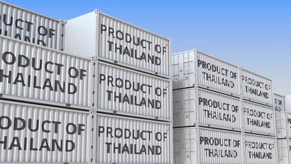 Containers with PRODUCT OF THAILAND Text in a Container Terminal