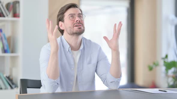 Man in Glasses Thinking Feeling Worried