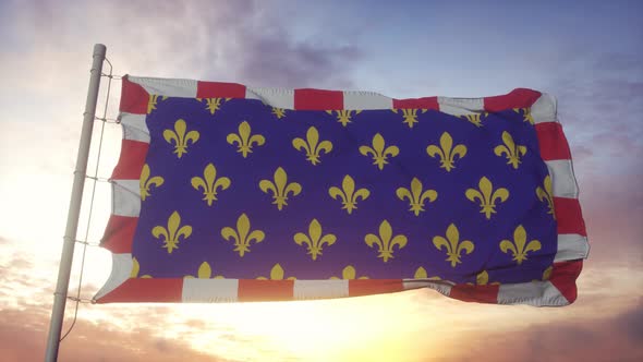 Touraine flag, France, waving in the wind, sky and sun background