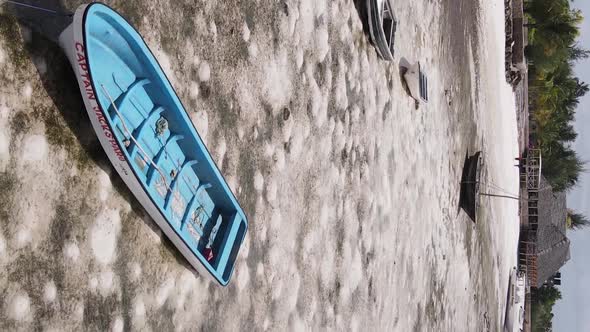 Vertical Video of Low Tide in the Ocean Near the Coast of Zanzibar Tanzania Aerial View