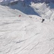 A Snowboarder Descends at Speed From a Mountainside in the Alps - VideoHive Item for Sale
