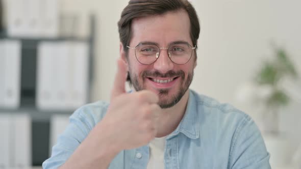 Portrait Young Man Showing Thumbs Up Sign