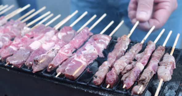 Meat skewers grilled on barbecue