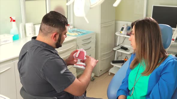 Woman Getting Professional Medical Advice at the Dentists