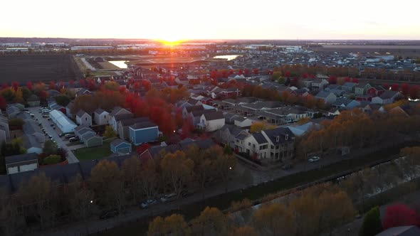 Colorful Fall Suburbs Neighborhood Car Sunset Drone Shot