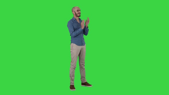 Handsom Arab Clapping His Hands Applauding on a Green Screen, Chroma Key