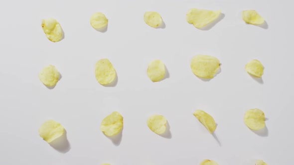 Close up of potato chips with copy space on white surface