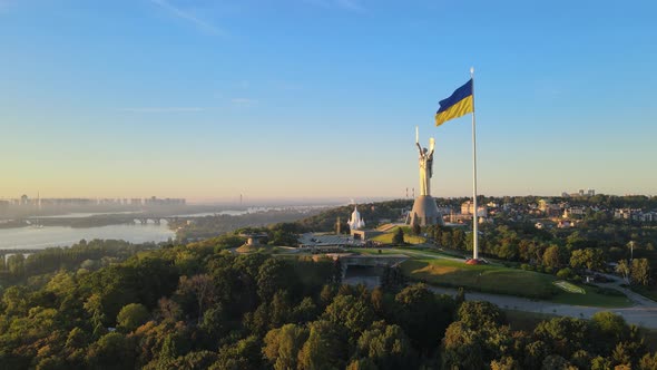 Ukrainian Flag in the Morning at Dawn. Aerial. Kyiv. Ukraine