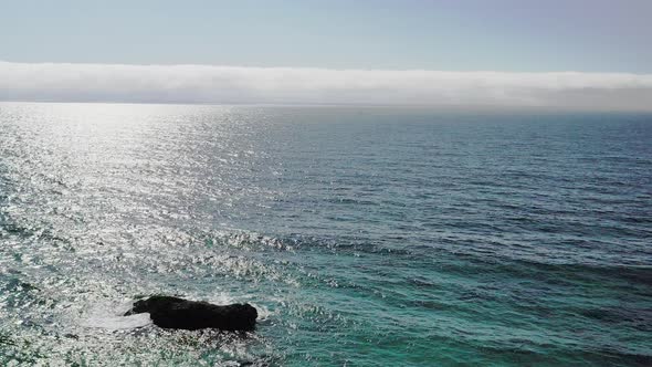 Calm blue ocean and sky during the day. Scenic horizon, aerial view