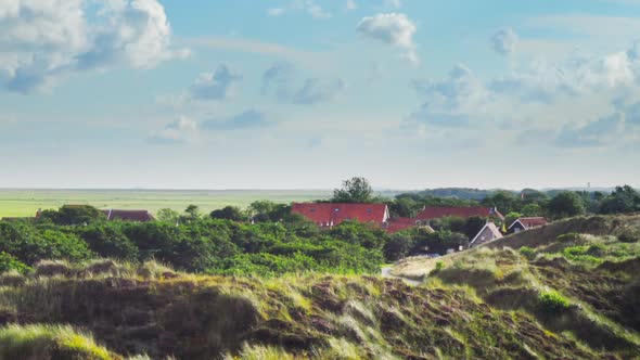 organic farming Dutch island Terschelling Boschplaat Oosterend view from dune ZOOM OUT