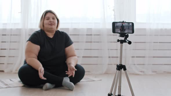 A Confident Overweight Woman Feminist Making a Video for Her Followers About Body Positivity